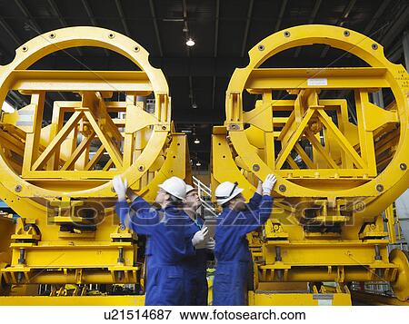 Stock Photo - Engineer in Turbine Hall. Fotosearch