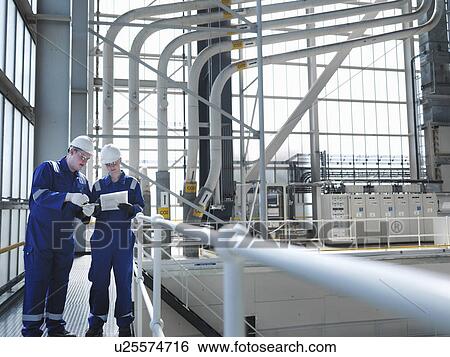 Engineers in Charging Hall View Large Photo Image Stock Photograph - Engineers in Charging Hall. Fotosearch