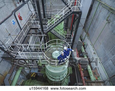 Stock Photo - Engineers in Pumping Station. Fotosearch