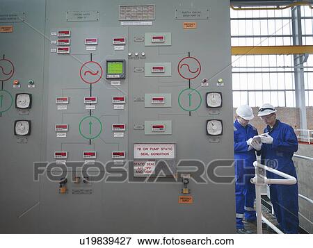 Stock Photo - Engineers in Pumping Station. Fotosearch