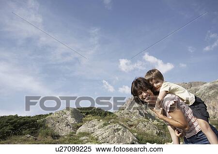 Stock Photography - Family excursion to mountains. Fotosearch
