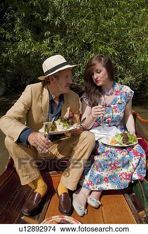 Father and daughter on a vintage boat View Large Photo Image Picture - Father and daughter on a vintage boat. Fotosearch