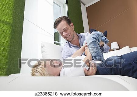 Father and son kidding around View Large Photo Image Stock Photo - Father and son kidding around. Fotosearch