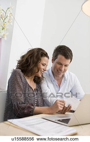 Stock Photograph - Financial talk. Fotosearch