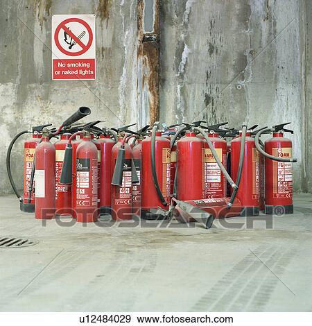 Fire extinguishers and no smoking sign View Large Photo Image Stock Photo - Fire extinguishers and no smoking sign. Fotosearch