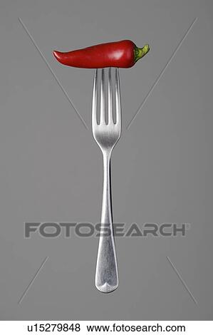 Stock Photo - Fork with a chili pepper. Fotosearch