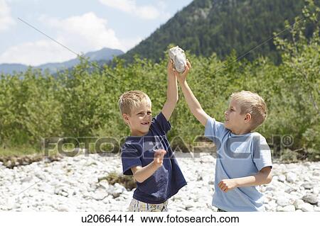 Picture - Free Time by the River in the Mountains. Fotosearch