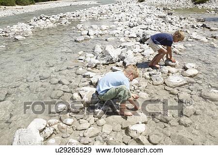 Free Time by the River in the Mountains View Large Photo Image Stock Photo - Free Time by the River in the Mountains. Fotosearch