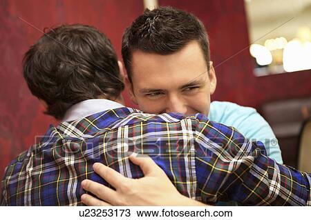 Friends in a bar / restaurant View Large Photo Image Stock Image - Friends in a bar / restaurant. Fotosearch