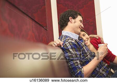 Stock Photo - Friends in a bar / restaurant. Fotosearch