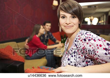 Friends in a bar / restaurant View Large Photo Image Stock Photograph - Friends in a bar / restaurant. Fotosearch