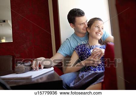 Friends in a bar / restaurant View Large Photo Image Stock Photograph - Friends in a bar / restaurant. Fotosearch