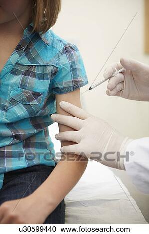 Girl having Injection View Large Photo Image Stock Image - Girl having Injection. Fotosearch