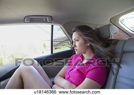 Stock Photograph - Girl in car. Fotosearch