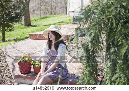 Girl sitting on steps View Large Photo Image Stock Image - Girl sitting on steps. Fotosearch