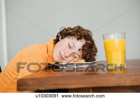 Girl sleeping on plate with toast bread View Large Photo Image Stock Image - Girl sleeping on plate with toast bread. Fotosearch