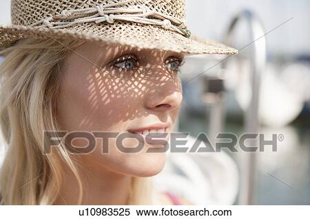 Stock Photography - Girl wearing hat. Fotosearch
