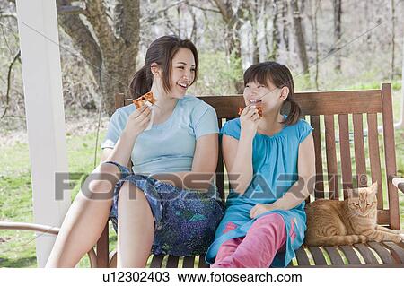 Girls eatting pizza View Large Photo Image Stock Image - Girls eatting pizza. Fotosearch