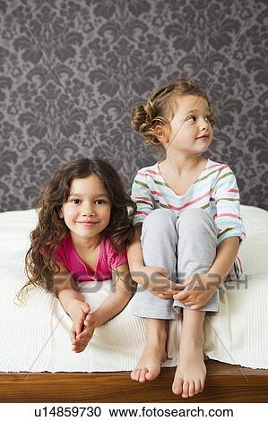 Girls in parents bed View Large Photo Image Stock Image - Girls in parents bed. Fotosearch