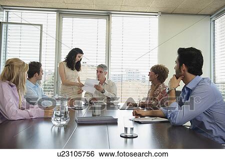 Group of people in boardroom meeting View Large Photo Image Stock Photograph - Group of people in boardroom meeting. Fotosearch