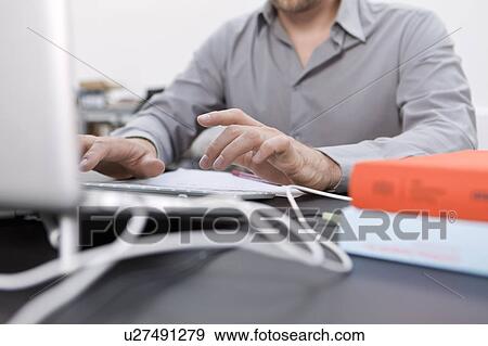 Hands typing on laptop View Large Photo Image Stock Photo - Hands typing on laptop. Fotosearch
