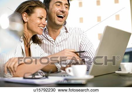 Stock Image - Happy business people. Fotosearch