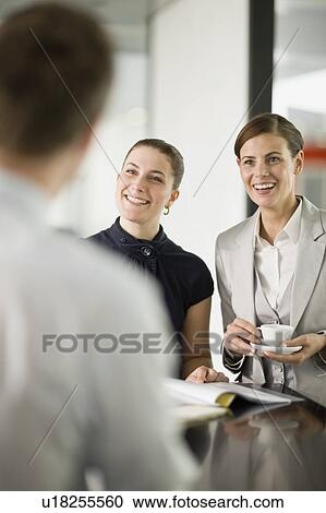 Stock Image - Happy office life. Fotosearch