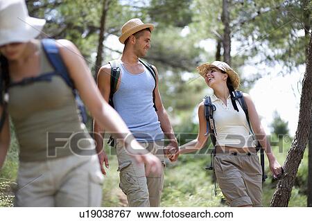 Stock Photo - Hikers on coastal path. Fotosearch