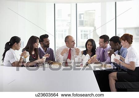 Informal business lunch meeting View Large Photo Image Picture - Informal business lunch meeting. Fotosearch