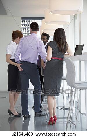 Informal business meeting View Large Photo Image Stock Photo - Informal business meeting. Fotosearch