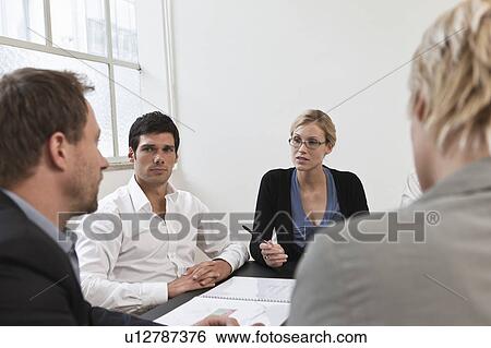 Intensively discussing their plan View Large Photo Image Stock Photograph - Intensively discussing their plan. Fotosearch