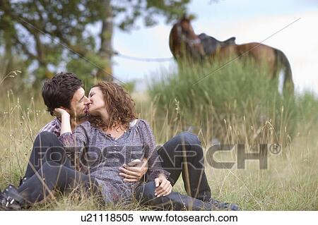 Stock Photography - Kissing couple. Fotosearch