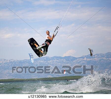 Kitesurfer jumping View Large Photo Image Stock Photography - Kitesurfer jumping. Fotosearch