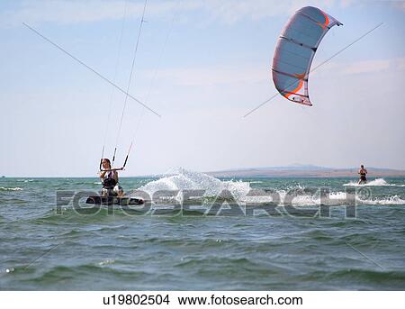 Picture - Kitesurfer speeding. Fotosearch