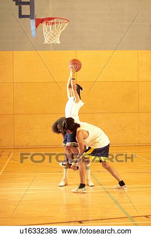 Lifting player up to basket View Large Photo Image Stock Photography - Lifting player up to basket. Fotosearch