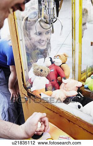 Stock Image - Man fishing toy. Fotosearch