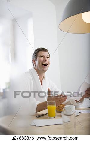 Stock Photography - Man getting good news. Fotosearch