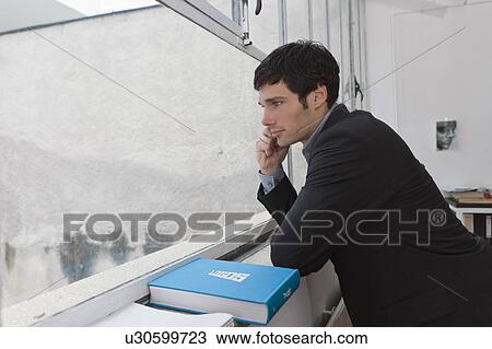 Man having a business conversation View Large Photo Image Stock Image - Man having a business conversation. Fotosearch