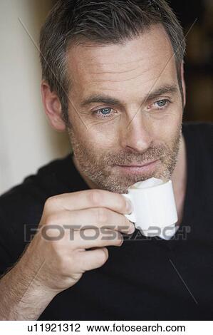 Man having espresso View Large Photo Image Stock Image - Man having espresso. Fotosearch