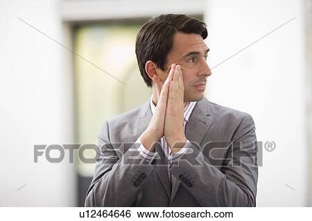 Stock Photograph - Man in a street. Fotosearch