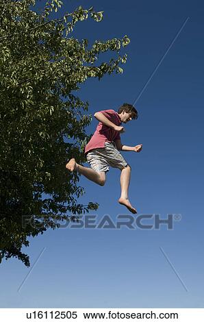 Man jumping View Large Photo Image Stock Photography - Man jumping. Fotosearch