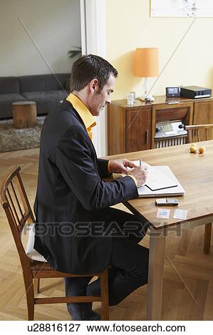 Man making notes View Large Photo Image Stock Photo - Man making notes. Fotosearch