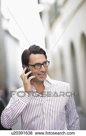 Man on the phone View Large Photo Image Stock Photo - Man on the phone. Fotosearch