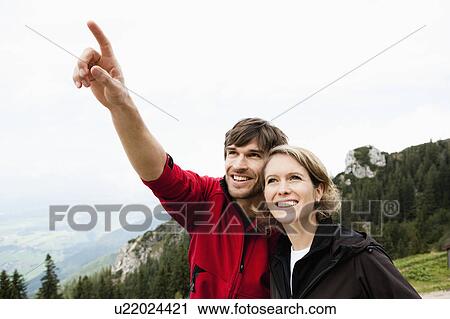 Man pointing to something View Large Photo Image Stock Image - Man pointing to something. Fotosearch