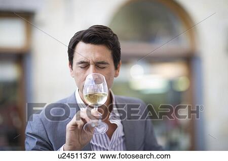 Man tasting whine View Large Photo Image Stock Image - Man tasting whine. Fotosearch