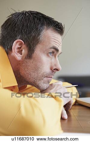 Stock Image - Man thinking. Fotosearch