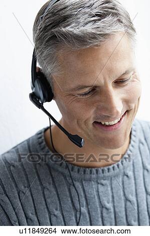 Man with headphone close-up View Large Photo Image Picture - Man with headphone close-up. Fotosearch