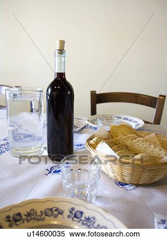 Meal table set with bread and wine View Large Photo Image Stock Photography - Meal table set with bread and wine. Fotosearch