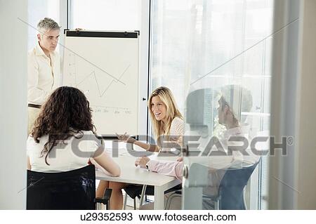 Meeting in modern office View Large Photo Image Stock Image - Meeting in modern office. Fotosearch