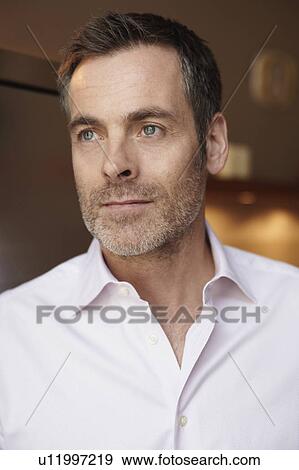 Mid age man portrait View Large Photo Image Stock Photo - Mid age man portrait. Fotosearch